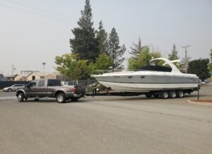 PLEASURE POWER BOAT 2005–FORMULA 330SS Pleasure Cruiser 33' long, Trailer & Tow Vehicle Included